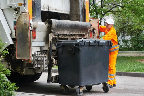 Training session for waste removal staff using PPE